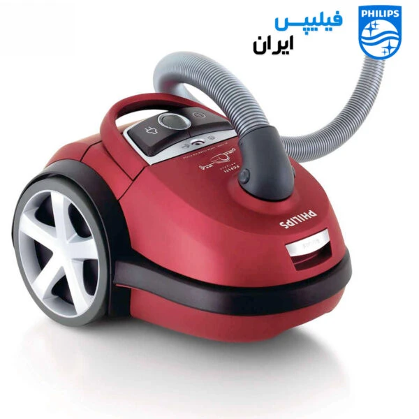 A red vacuum cleaner with a hose

AI-generated content may be incorrect.